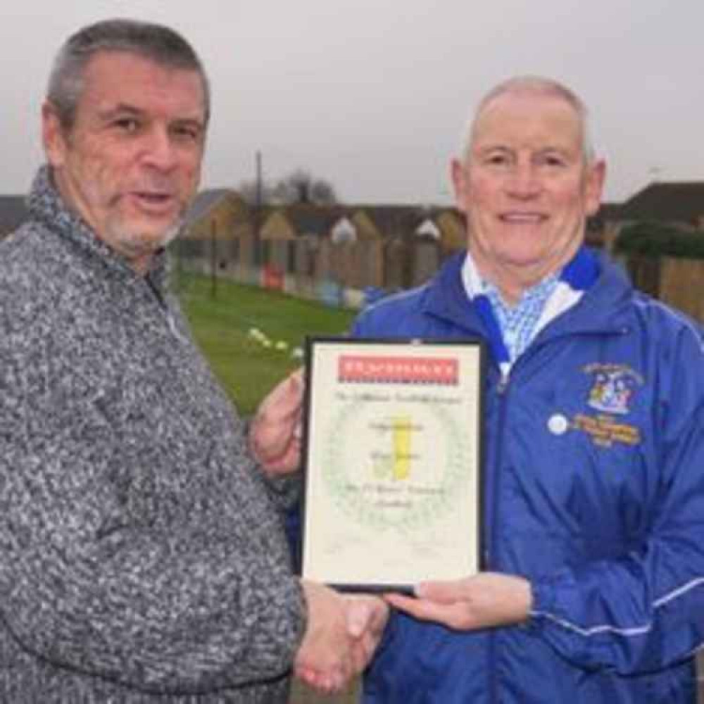 The service of Glyn Jarvis (right) to local community football was marked when he was presented with an award by the Isthmian League to mark 25 years of helping the game prosper at grassroots level.