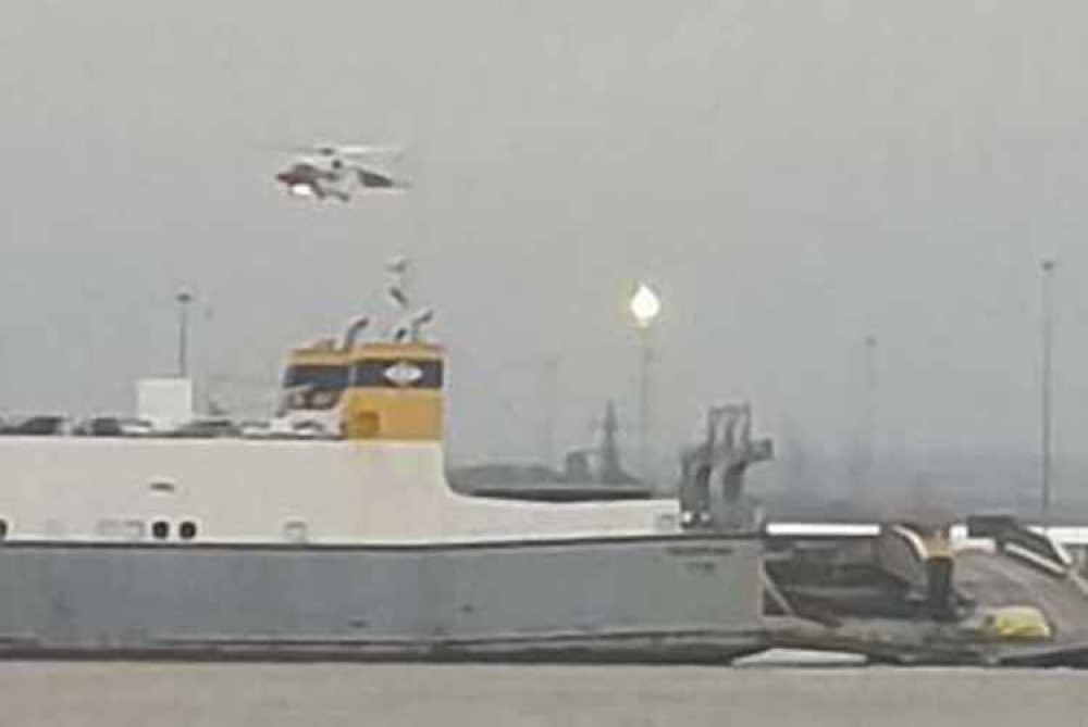 The Coastguard helicopter hovers over the ship. Picture by Steve Mairs.