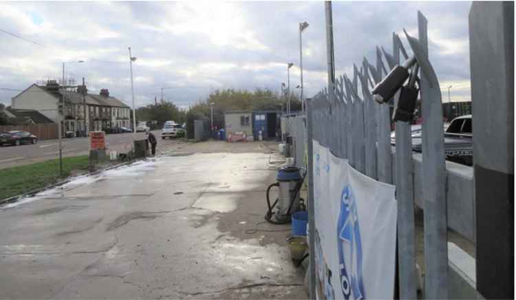 The frontage onto Southend Road includes a hand car wash.