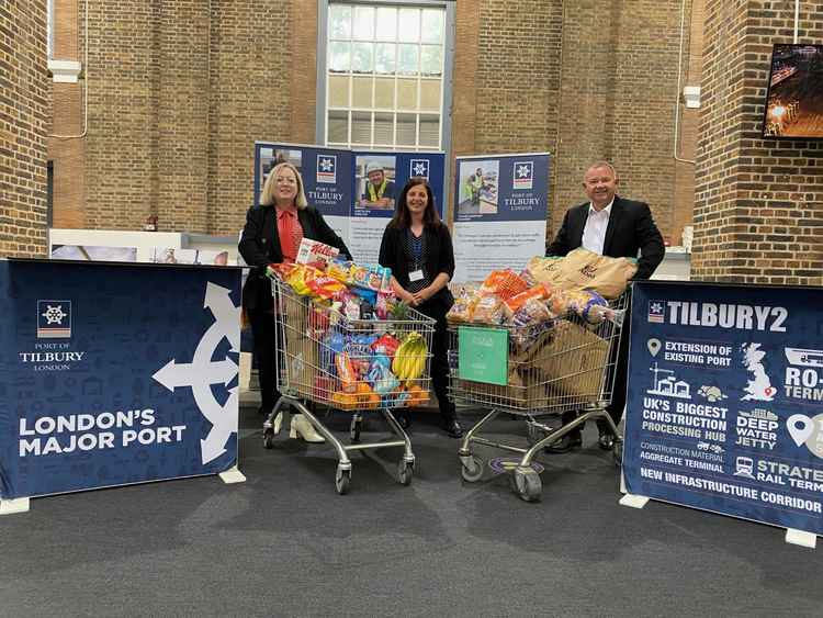 Thurrock MP Jackie Doyle-Price, Michelle Primrose (group HR Manager from Forth Ports) and Paul Dale, Site and Asset Director from The Port of Tilbury at the Port's Recruitment Event with some of the thousands of products shipped through the port.