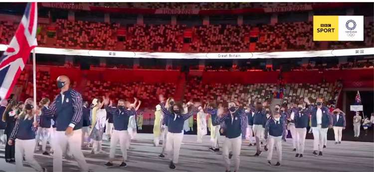 Representatives of the GB team enter the stadium at today's opening ceremony.