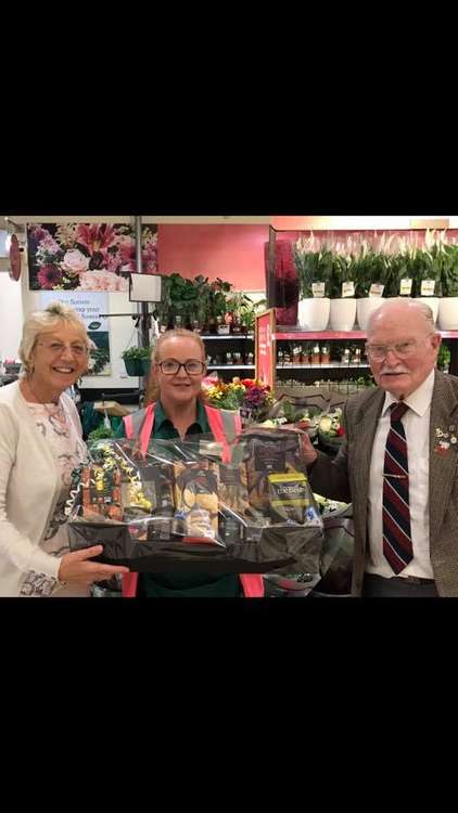 Tarnya presents Jim and Vanessa with the hamper.