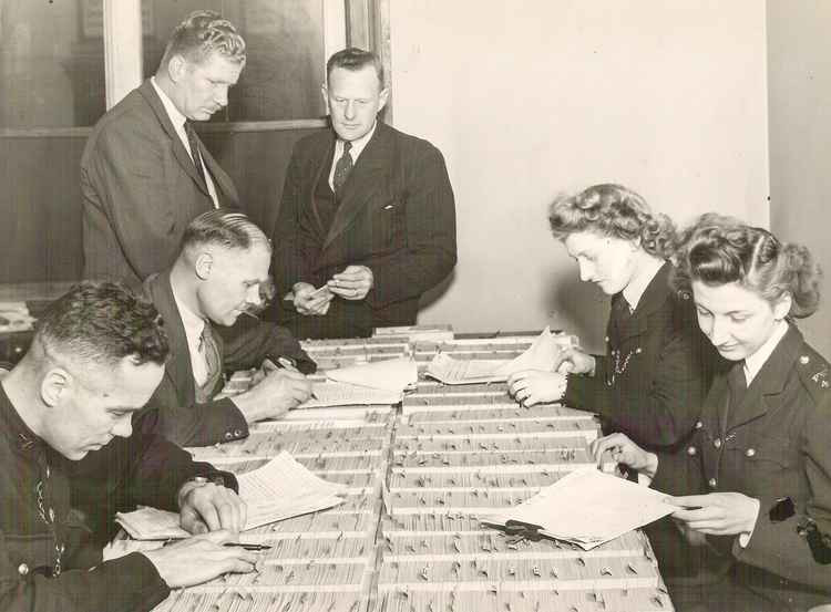 Blackburn police officers with some of the 46,000 fingerprints that were taken