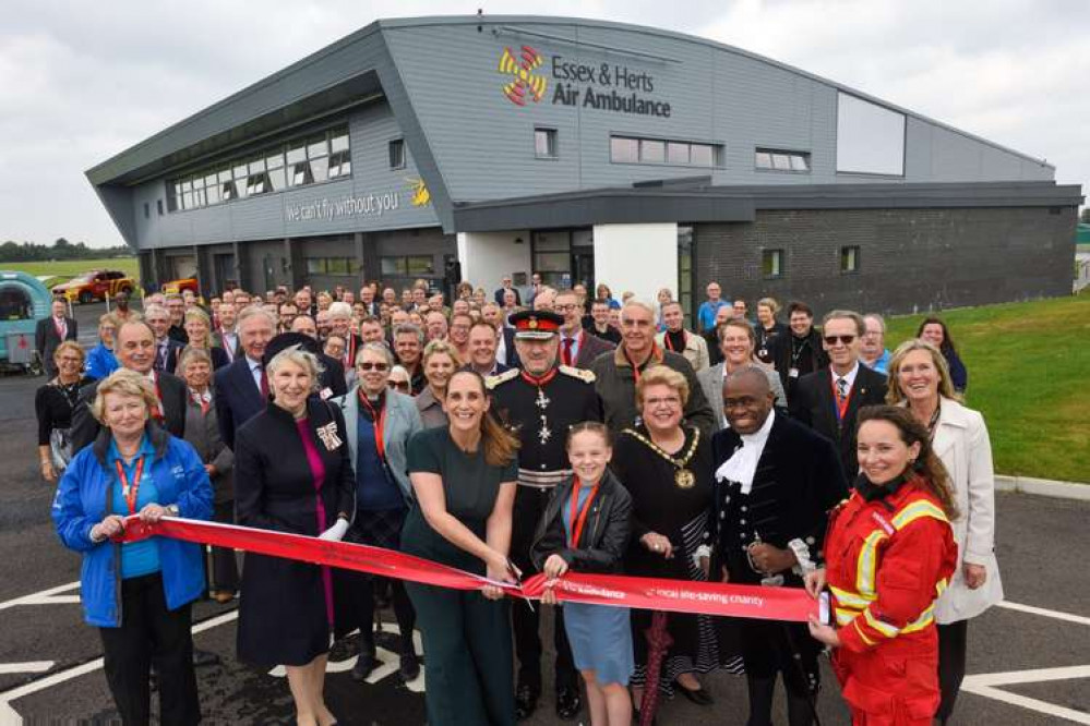 Essex & Herts Air Ambulance CEO Jane Gurney, and airlifted patient Maisie Moon, cut the ribbon to officially open the new airbase at North Weald.