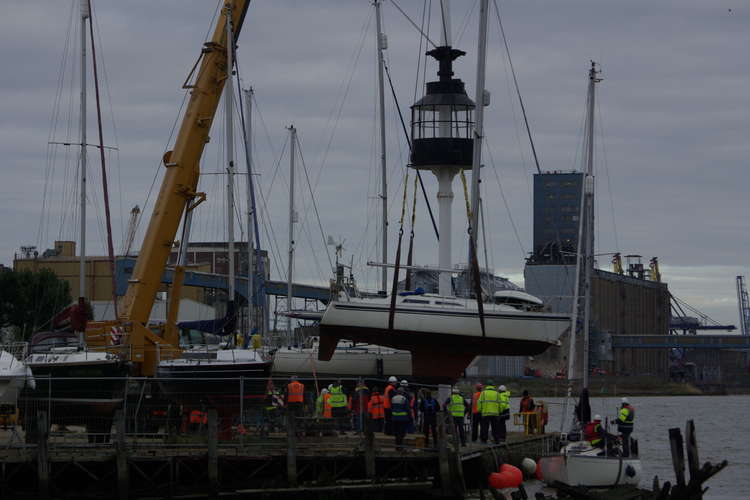 Crane in action, lifting yachts from the water