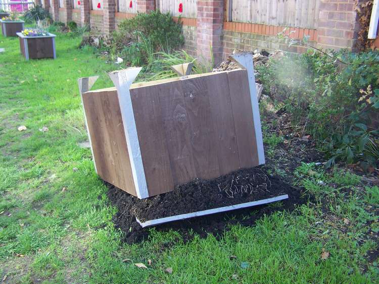 The upturned damaged planter. The upturned damaged planter.