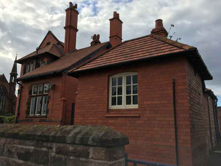 The former Heswall police station