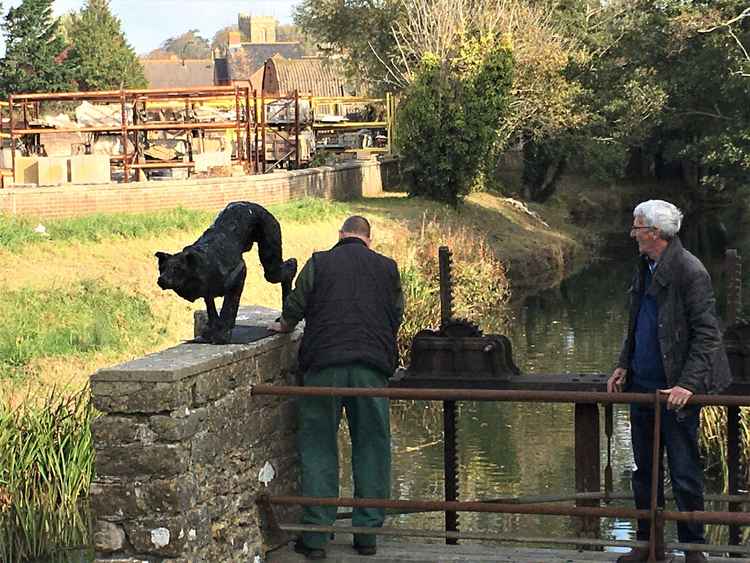 The Stalking Dog by Greta Berlin being installed Picture: Margie Barbour