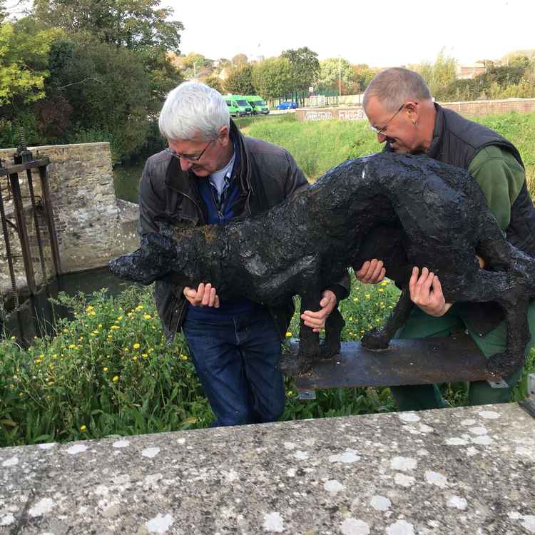 The Stalking Dog by Greta Berlin being installed Picture: Margie Barbour