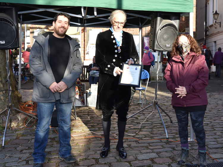 Karl and Alex Lewis receive their award from Dorset High Sheriff George Streitfeild Picture: Tim Russ