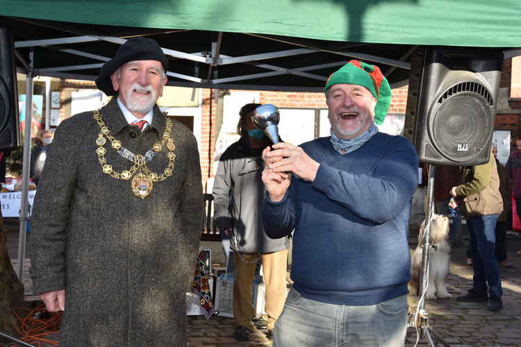 Winner of best dressed Christmas window Animal House Mark Dicker with Bridport mayor Ian Bark Picture: Tim Russ