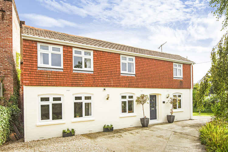 Three-bed detached house in St Andrews Road, offered by Stags