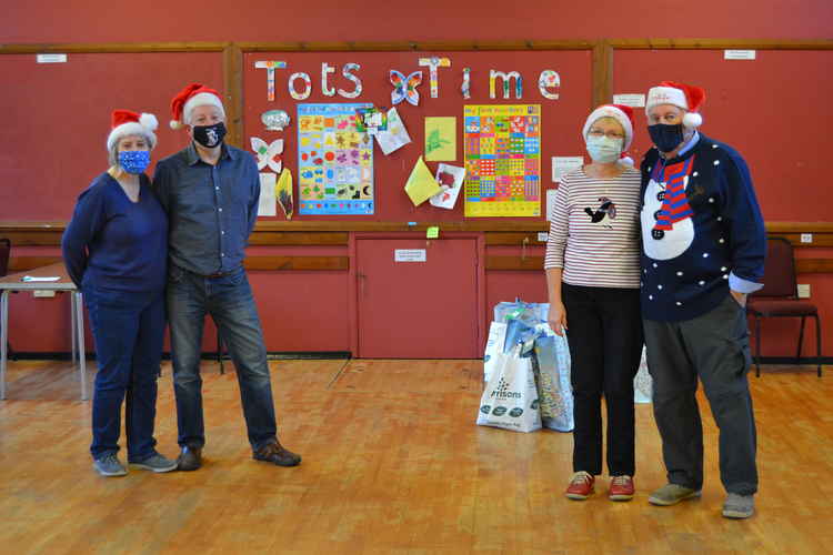 The team behind the Christmas Hampers and Stockings, Alison Harpur, Steve Crimp and Mish and Steve Bartlett