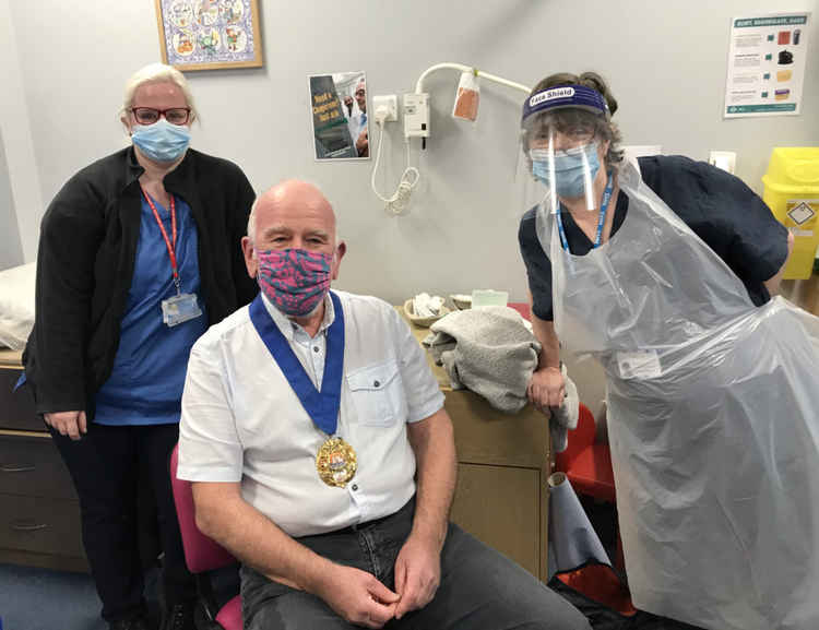 Bridport mayor, Cllr Ian Bark, receives his first coronavirus vaccine at Bridport Medical Centre