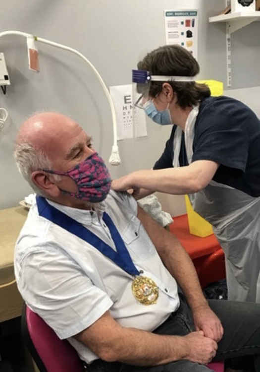 Bridport mayor, Cllr Ian Bark, receives his first coronavirus vaccine at Bridport Medical Centre