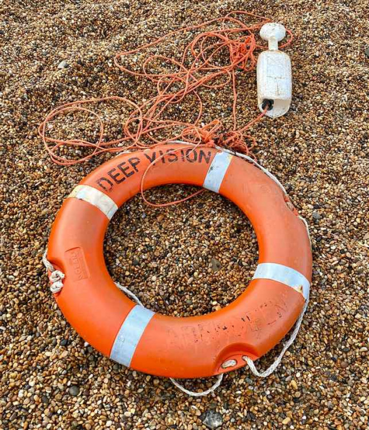The life ring washed up on Cogden Beach