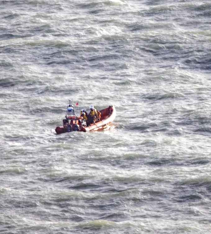 The lifeboat at the scene Picture: Neil Barnes