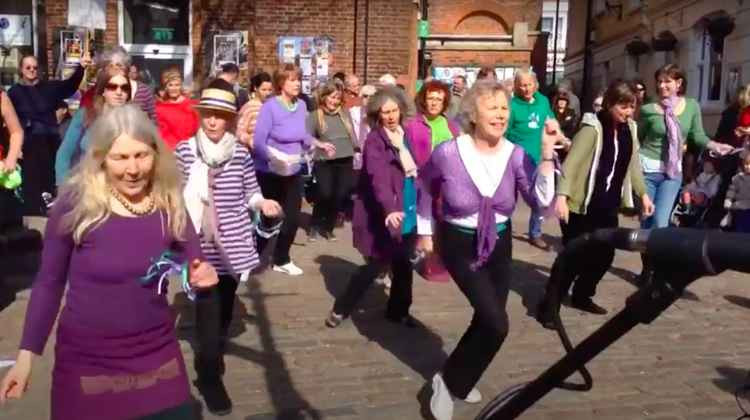 In 2014, women came together in Bucky Doo Square to dance and mark International Women's Day