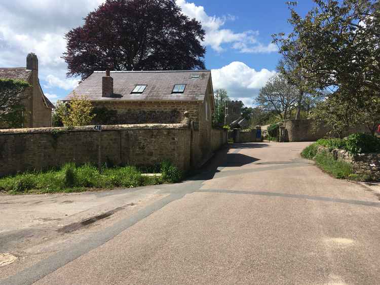 Take the footpath to the left just before Loders church