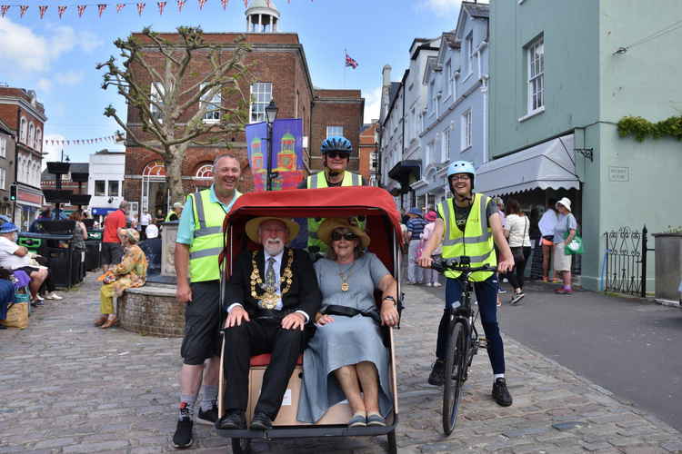 Bridport mayor, Cllr Ian Bark, and his wife, Anne, enjoy a trishaw ride Picture: Tim Russ