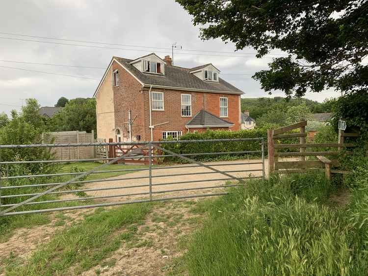 Go over the stile - it was very wobbly so take extra care - and round to the right with the lane