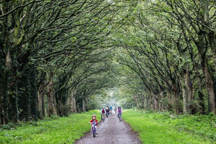 Cyclists take in one of the Leverhulme Estate tracks