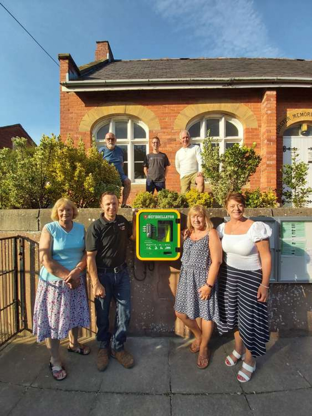 Top row from left; Colin Baker, Bradpole Parish Council chairman, Jody Leaf and Paul Butt of Bradpole Fete Committee, front row from left; Wendy Smart, Bradpole parish councillor, Robert Stephenson electrical contractor, Dawn Adwick and Claire Botten of B