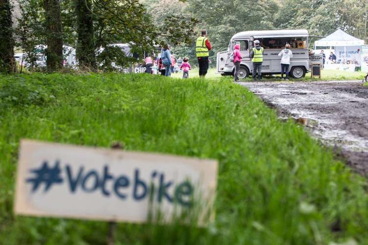 Cyclists enjoy refreshments during a Summer Cycle