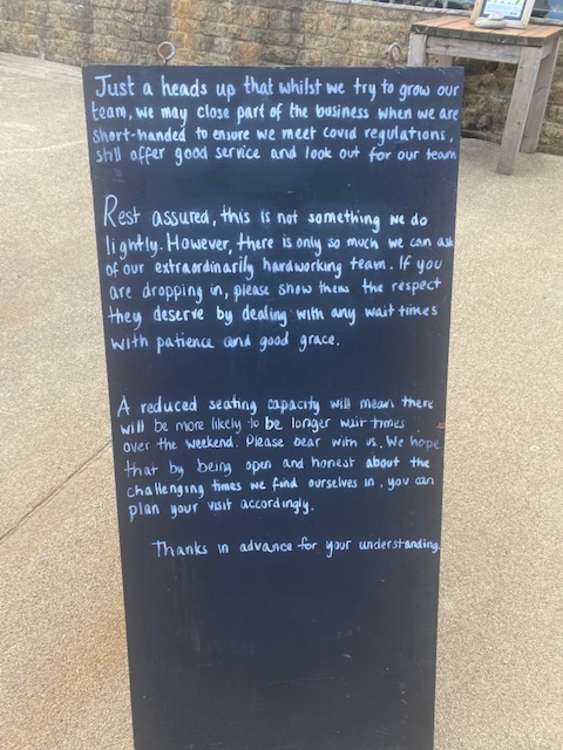 A sign explaining closures at The Anchor Inn, Seatown