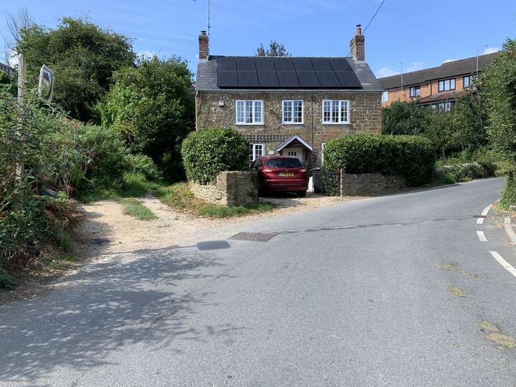 On a right-hand bend, continue straight down the footpath