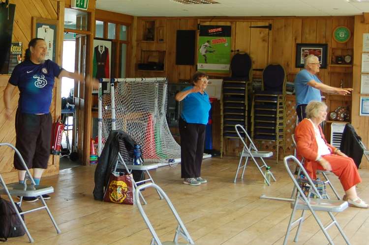 Sitting and standing rehab exercise at Stepping Out