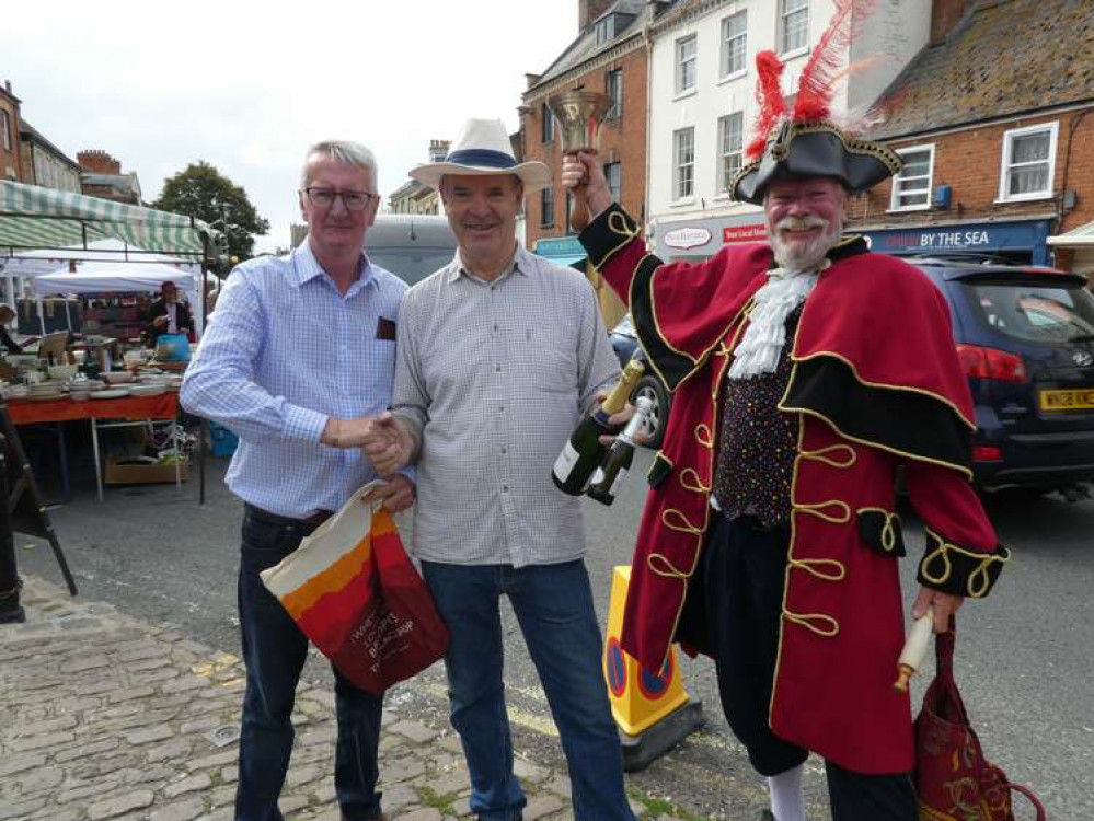 John Charnley, centre, with town surveyor Daryl Chambers, left, and town crier John Collingwood