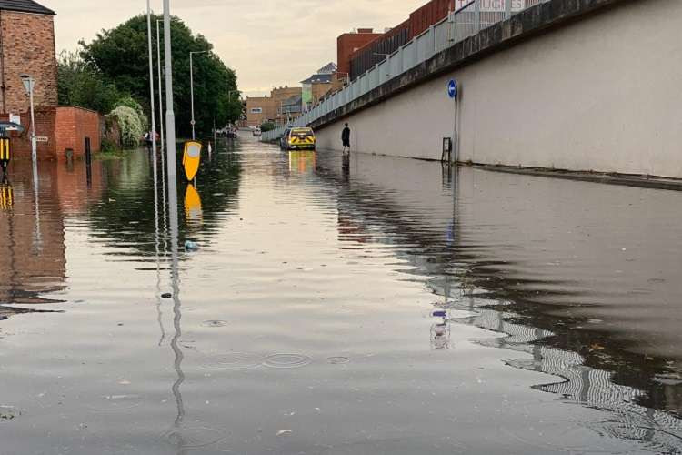 Floodwater in Birkenhead's Borough Road