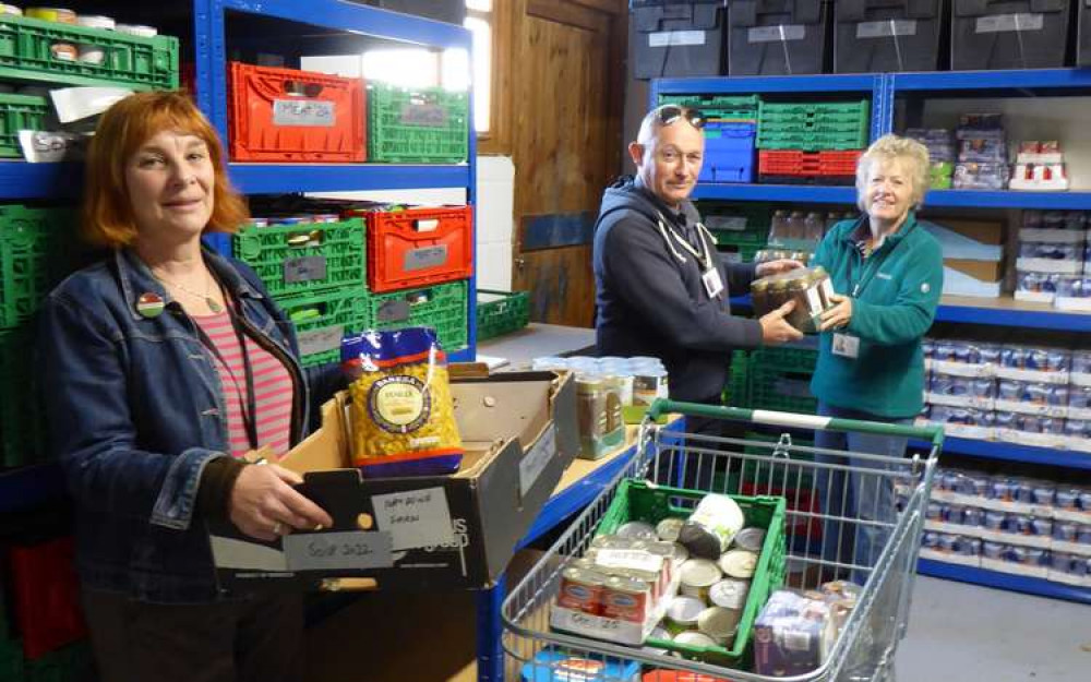 Bridport Bandits and Bridport Youth and Community Centre came to the aid of Cupboard Love Food Bank, pictured, left to right, Carrie Gamble, Charlie Bodycomb and Jan Parker