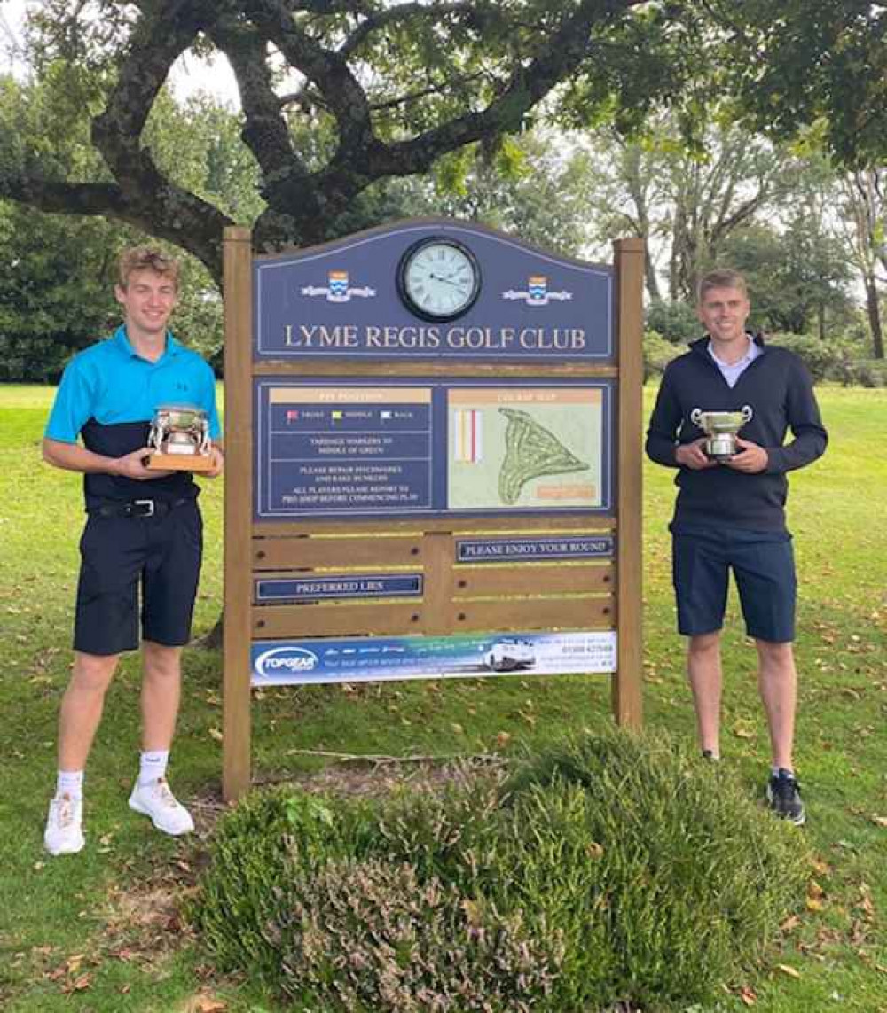 Barnaby Down, left,  with the Wellings Bowl and (right) club champion Scott Love with the Williams Bowl