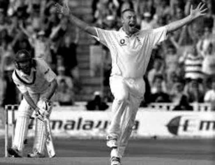 Andrew Flintoff celebrates in the 2005 second test