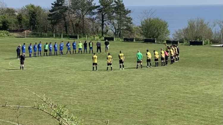 Lyme Regis Reserves and Clyst Valley observe a two minutes silence in memory of the Duke of Edinburgh