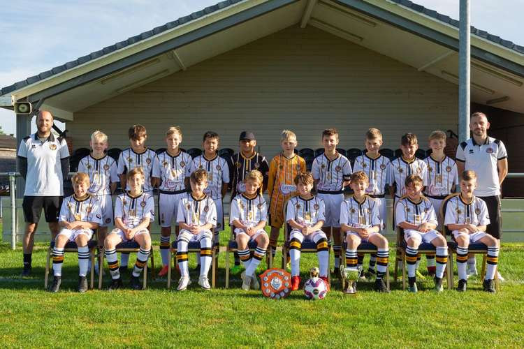 Axminster Town Under 13s pictured in their new strip donated by Lentells Accountants