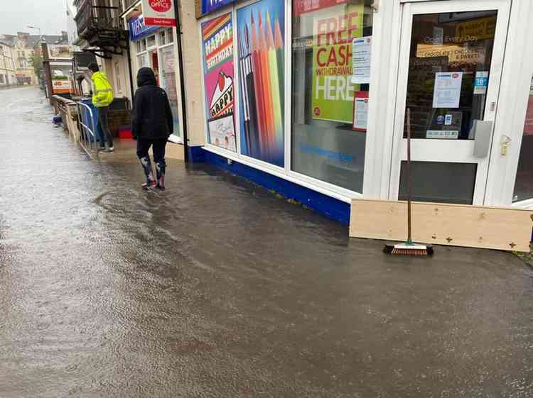 Makeshift flood defences helped protect the shop itself from damage