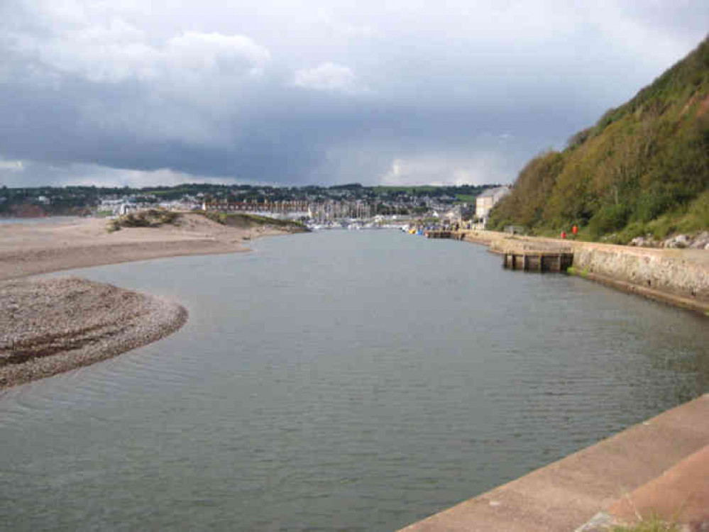 A canoe capsized at the mouth of the River Axe, a notoriously difficult area to navigate