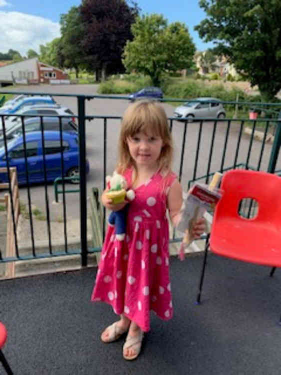 Children received a learning journal, gift and cake on their last day at Colyton Caterpillars