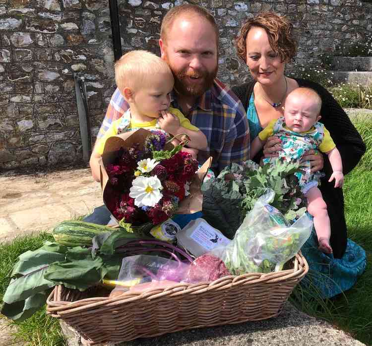 The Jones family with their prize delivery of fresh local food