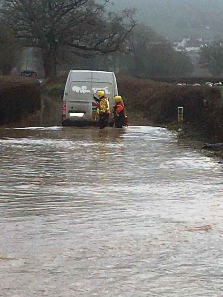 Whitford Bridge and Cownhayne Lane are impassable with flood water