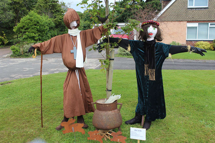 Residents, businesses and organisations decorated the village with medieval scarecrows