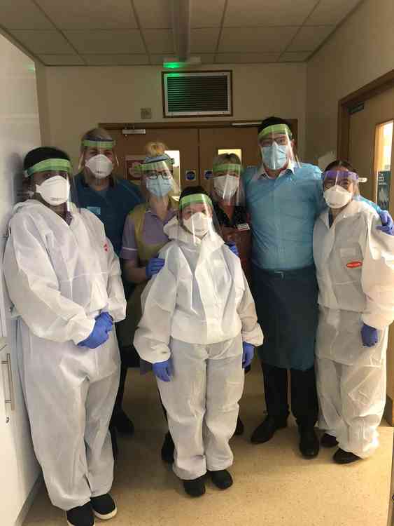 Staff at the Royal Stoke University Hospital wearing PPE made by Eaton Bank Academy.