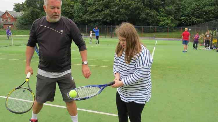 Ava Reid playing tennis