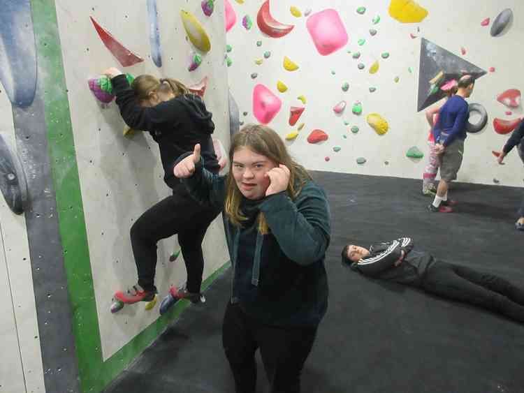 Ava rock climbing