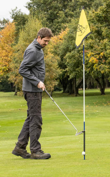 Andy Brougham demonstrates the contactless flagstick system at Astbury Golf Club. (Pictures by Bob Howell)