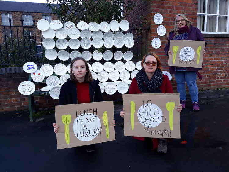 Cllr Jo Dale (centre) leads the protest outside Fiona Bruce MP's office in Congleton