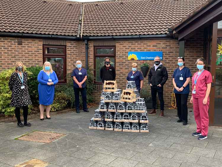 East Cheshire Hospice staff with Joe and Michael Manning from Beartown Brewery.